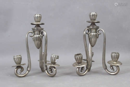 A pair of 19th century silver four light candlesticks