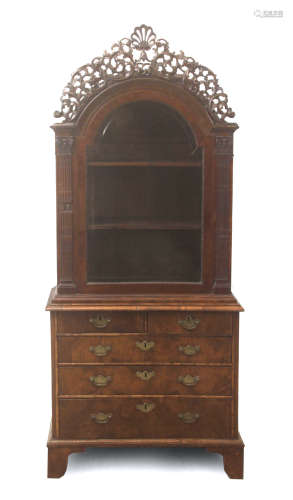 An 18th century Dutch mahogany glass cabinet