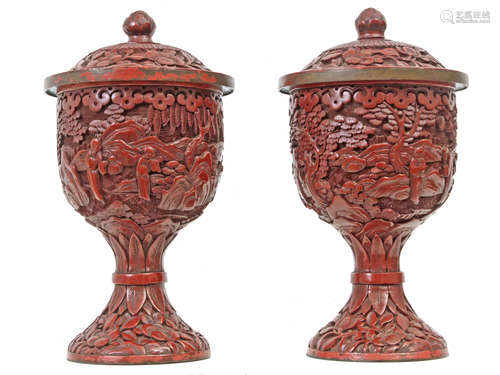 A pair of 18th century cinnabar lacquer vases and covers