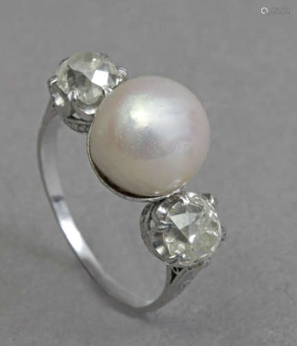 A first third of 20th century three stone diamonds and pearl...