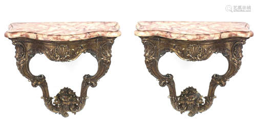 A first half of 20th century pair of Louis XV style corbels