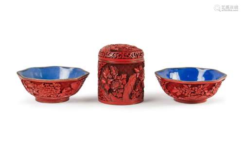 GROUP OF THREE CINNABAR ENAMEL CONTAINER AND BOWLS