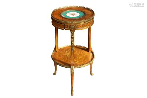 A FRENCH BRASS MOUNTED AND INLAID MAHOGANY CIRCULAR TABLE, M...