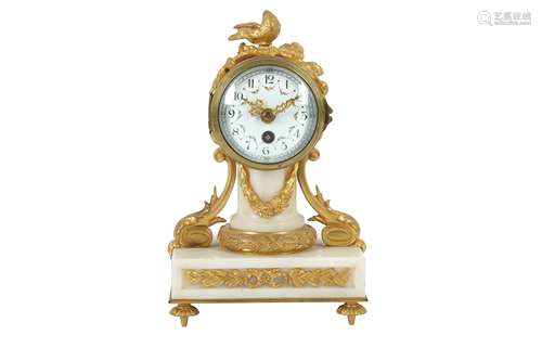 A FRENCH GILT BRONZE AND WHITE MARBLE MINIATURE MANTEL CLOCK...