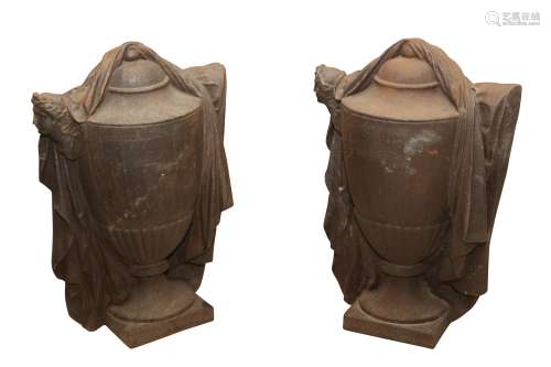 A PAIR OF NEO-CLASSICAL STYLE CAST IRON GARDEN URNS