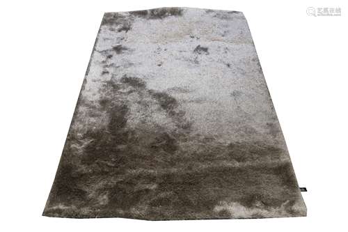 A 'BENUTA WHISPER' GREY POLYESTER RUG