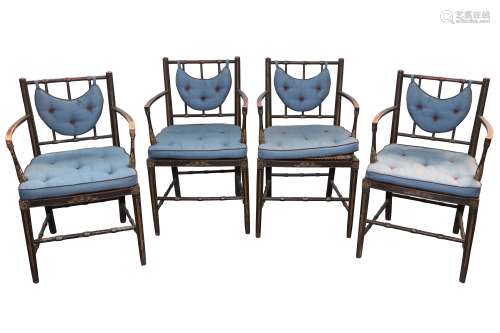 A SET OF FOUR REGENCY EBONISED AND PARCEL GILT ARMCHAIRS