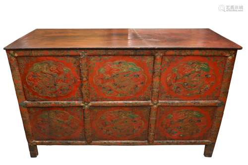 A TIBETAN RED LACQUERED SIDE CABINET
