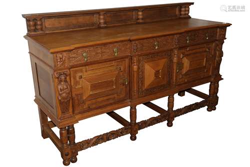 A RENAISSANCE REVIVAL OAK BREAKFRONT SIDEBOARD, EARLY 20TH C...