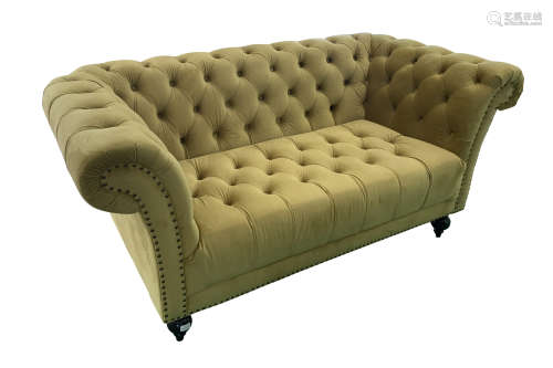 A CHESTERFIELD SOFA UPHOLSTERED IN MUSTARD YELLOW VELOUR FAB...