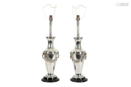 A PAIR OF NEOCLASSICAL TASTE WHITE METAL URN FORM TABLE LAMP...