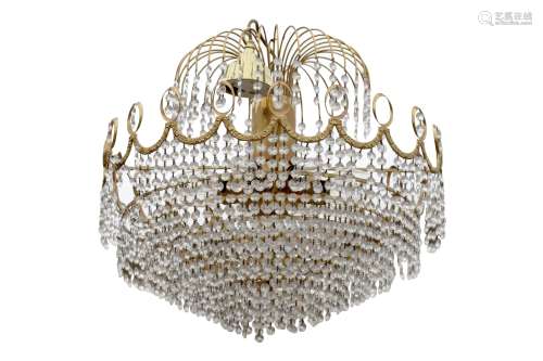 A GILT METAL AND LUSTRE HUNG EIGHT LIGHT CHANDELIER, 20TH CE...