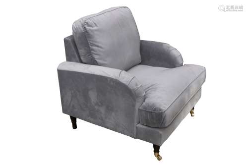 A CONTEMPORARY ARMCHAIR UPHOLSTERED IN GREY SUEDE STYLE FABR...