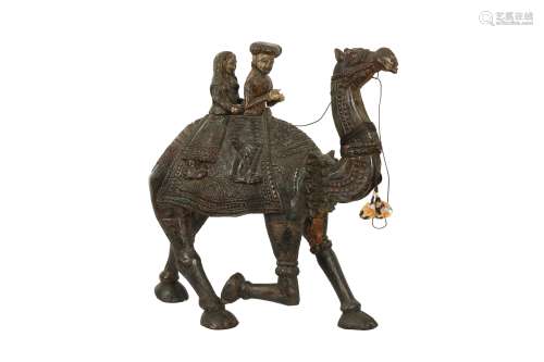 AN INDIAN HARDWOOD PAINTED CAMEL AND RIDERS, RAJASTHAN, NORT...