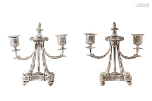 A PAIR OF NEO-CLASSICAL STYLE SILVER PLATED CANDELABRA