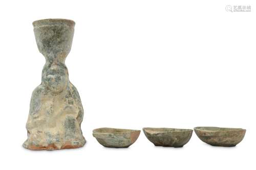 A CHINESE GREEN-GLAZED POTTERY CANDLESTICK AND THREE 'EAR' C...