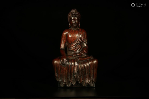 A BUDDHIST SITTING SHAKYAMUNI STATUE