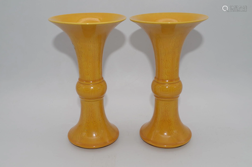 A PAIR OF PORCELAIN FLOWER HOLDERS