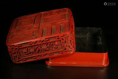 A RED LIDDED LACQURE BOX