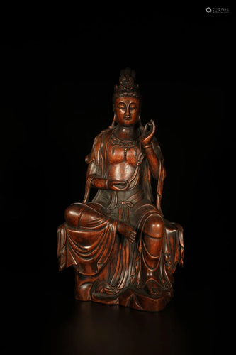 AN AGARWOOD SITTING GUANYIN STATUE