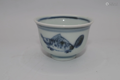 A BLUE-AND-WHITE GLAZED PORCELAIN CUP