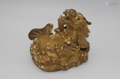 A GILT BRONZE PAPER WEIGHT