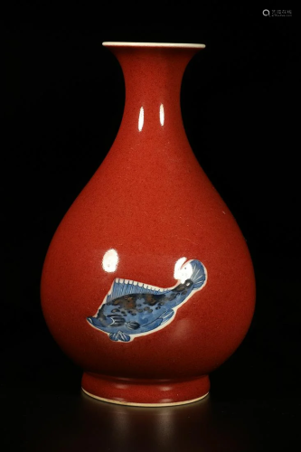 A ROUGE AND BLUE-AND-WHITE GLAZED VASE