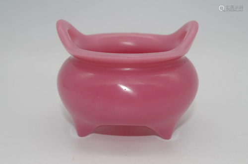 A ROUGE GLASS INCENSE BURNER OR HOLDER