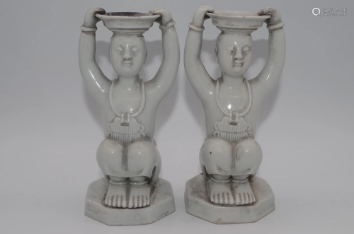 A PAIR OF PORCELAIN CANDLE STICKS