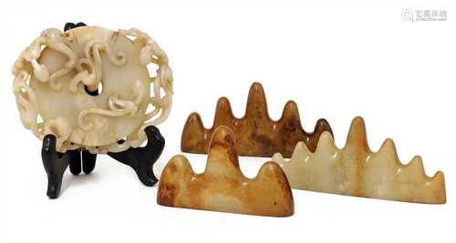 A collection of three Chinese jade brush rests,