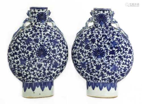 A pair of Chinese blue and white moon flasks,