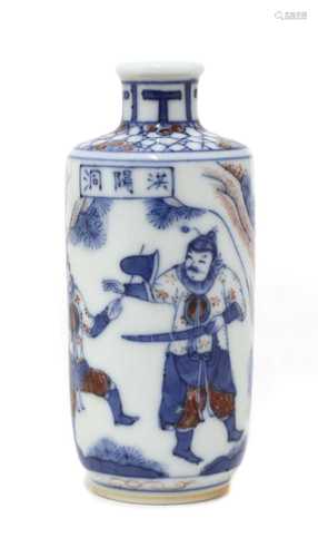 A Chinese underglaze blue and copper-red porcelain snuff bot...