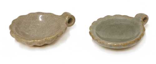 A pair of Chinese celadon-glazed bird feeders,