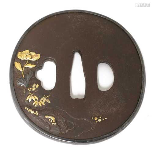 A Japanese bronze Goto School tsuba,