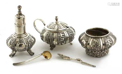 A Chinese silver salt, mustard pot and pepper shaker set,