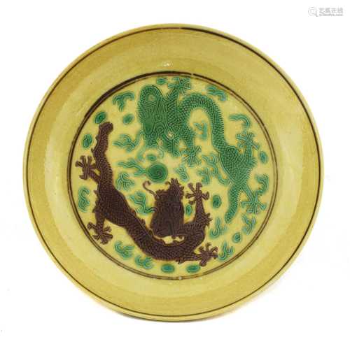 A Chinese Imperial porcelain sancai saucer dish,