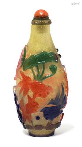 A Chinese six-colour Peking glass overlay snuff bottle,