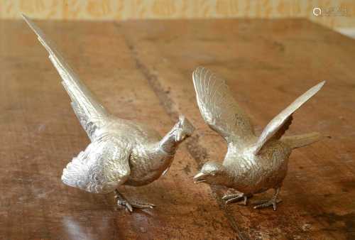 A pair of Elizabeth II silver models of pheasants,