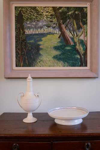 A Wedgwood creamware urn,