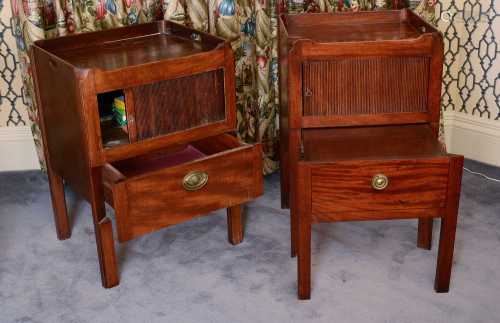 A matched pair of George III mahogany tray top commodes,