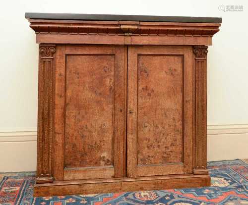 A George IV oak cupboard,
