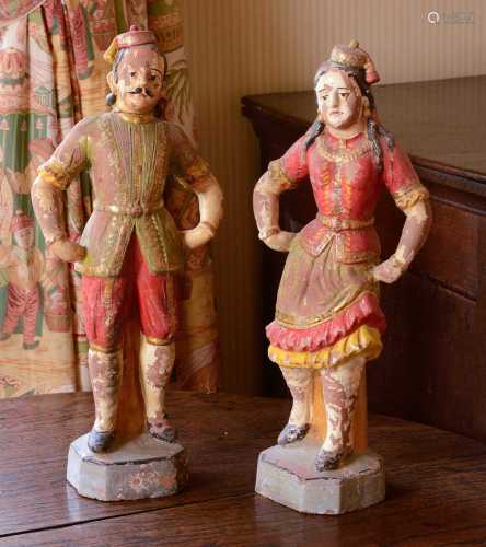 A pair of glazed terracotta figures,