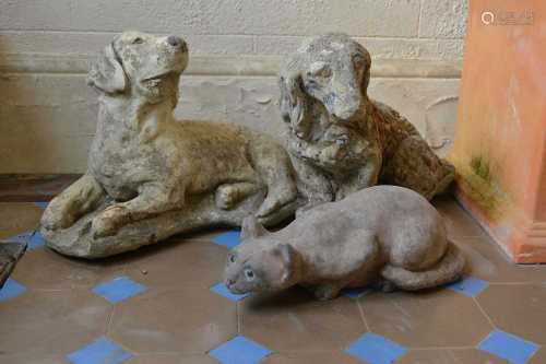 A cast composite figure of a seated dog,