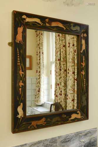A painted wall mirror,