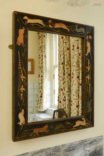 A painted wall mirror,