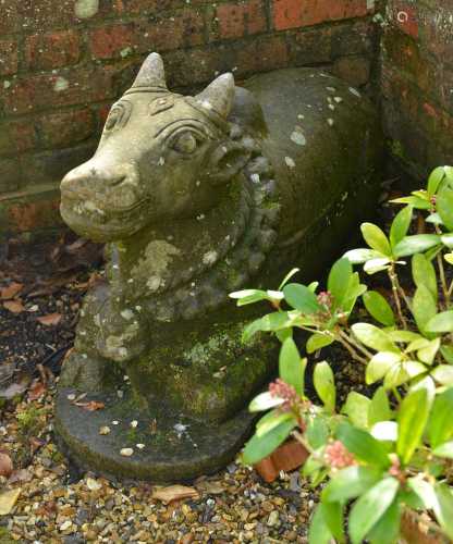 An Indian carved stone figure of Nandi,