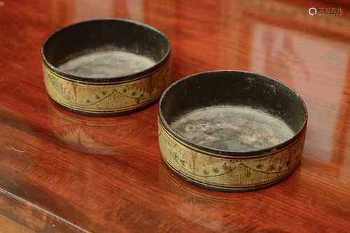 A pair of Regency papier-mâché wine coasters,