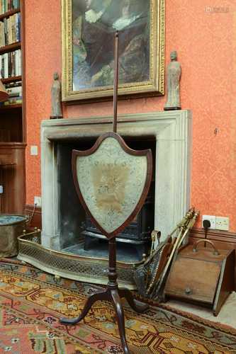 A Regency mahogany pole screen,