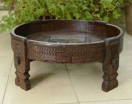 A rustic hardwood low coffee table,