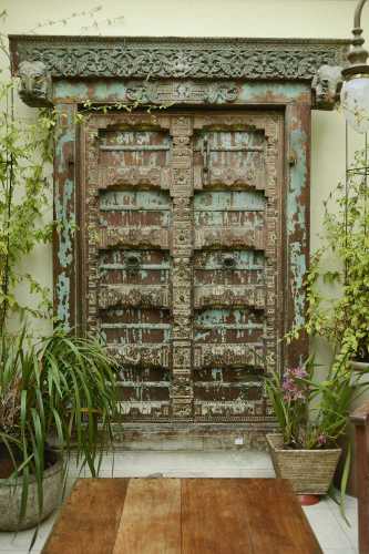 A large Indian carved hardwood door,